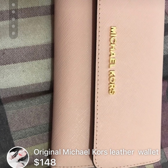Original Michael Kors Pink wallet extremely new